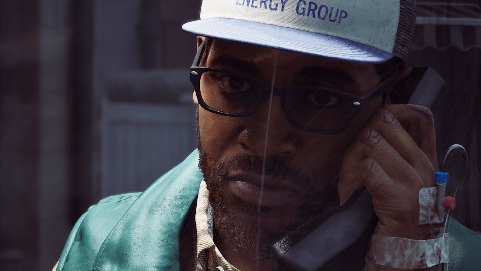 Simon holds a telephone receiver to his ear